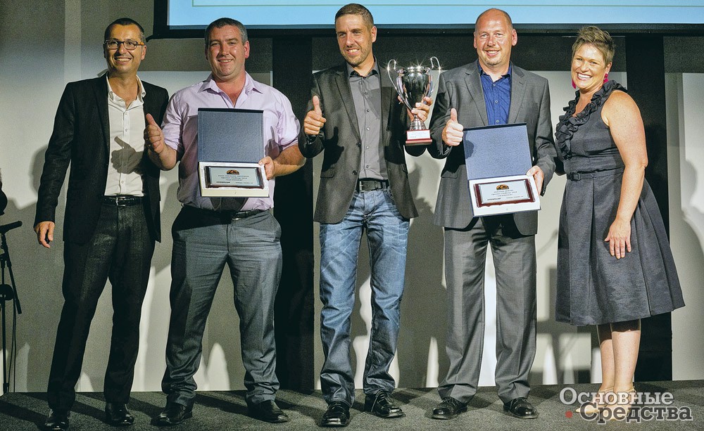 Победители европейского конкурса операторов техники Caterpillar: в центре – С. Бэр, справа от него – Х. Кехль, слева от него – П. Хеффернан